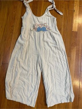 Light Cream Tie-Shoulder Jumpsuit with Embroidered quilted Patch